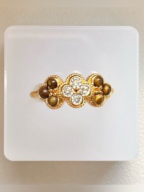 Gold Floral Ring with Brown Gem Accents
